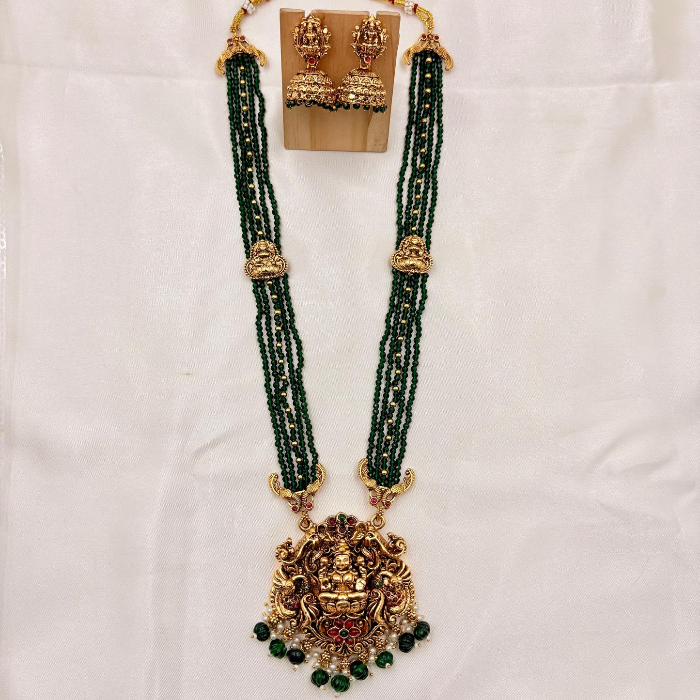 Temple Jewellery Lakshmi Pendant Green Beads Necklace Set with Jhumka Earrings | Antique Gold Finish