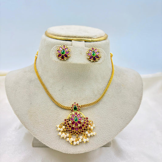 Gold Finish Ruby-Green Kundan Pendant Necklace Set with Pearl Drops