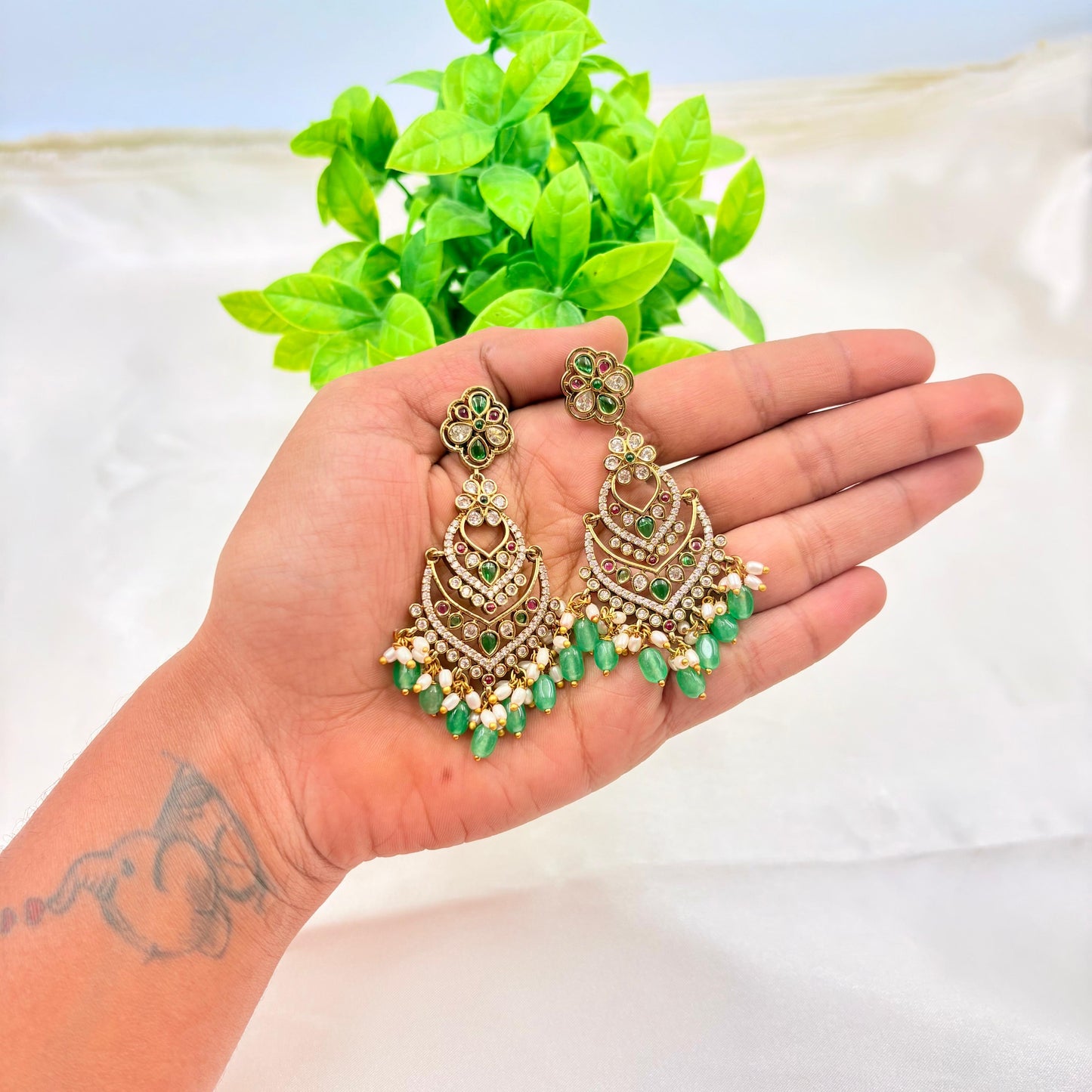 Traditional Gold Finish Kundan Chandelier Earrings with Green Drops