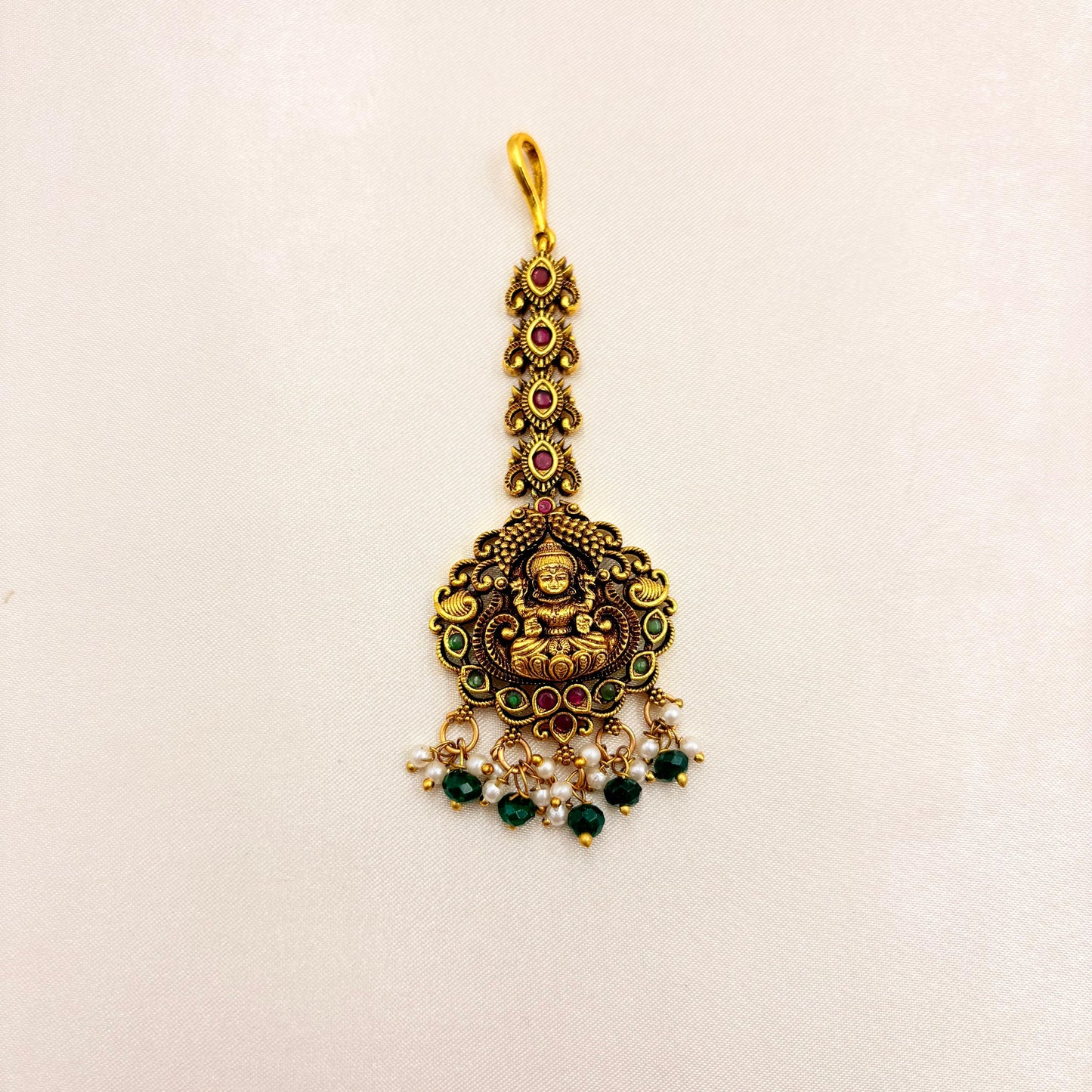 Lakshmi Temple Maang Tikka with Green Beads & Pearl Drops – Antique Gold Finish