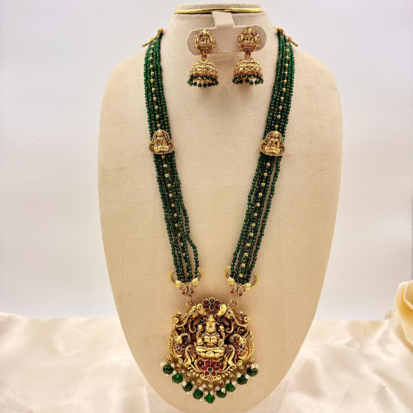 Temple Jewellery Lakshmi Pendant Green Beads Necklace Set with Jhumka Earrings | Antique Gold Finish