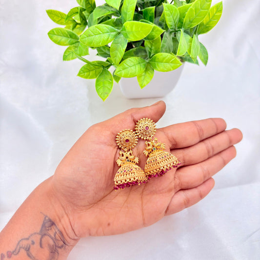 Antique Gold Temple Jhumka Earrings with Peacock Motif & Red Stones