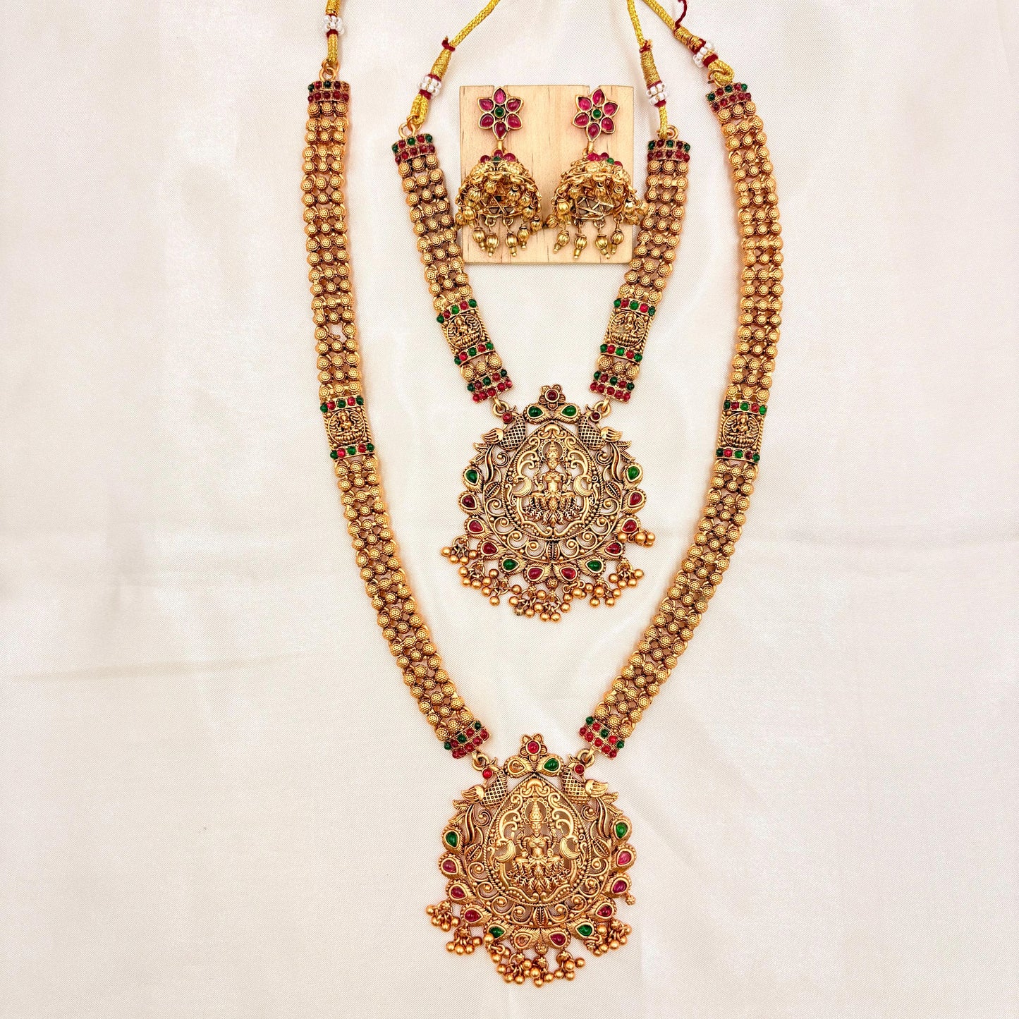 Grand Double Layer Antique Gold Temple Haram with Lakshmi Pendants & Jhumka Earrings