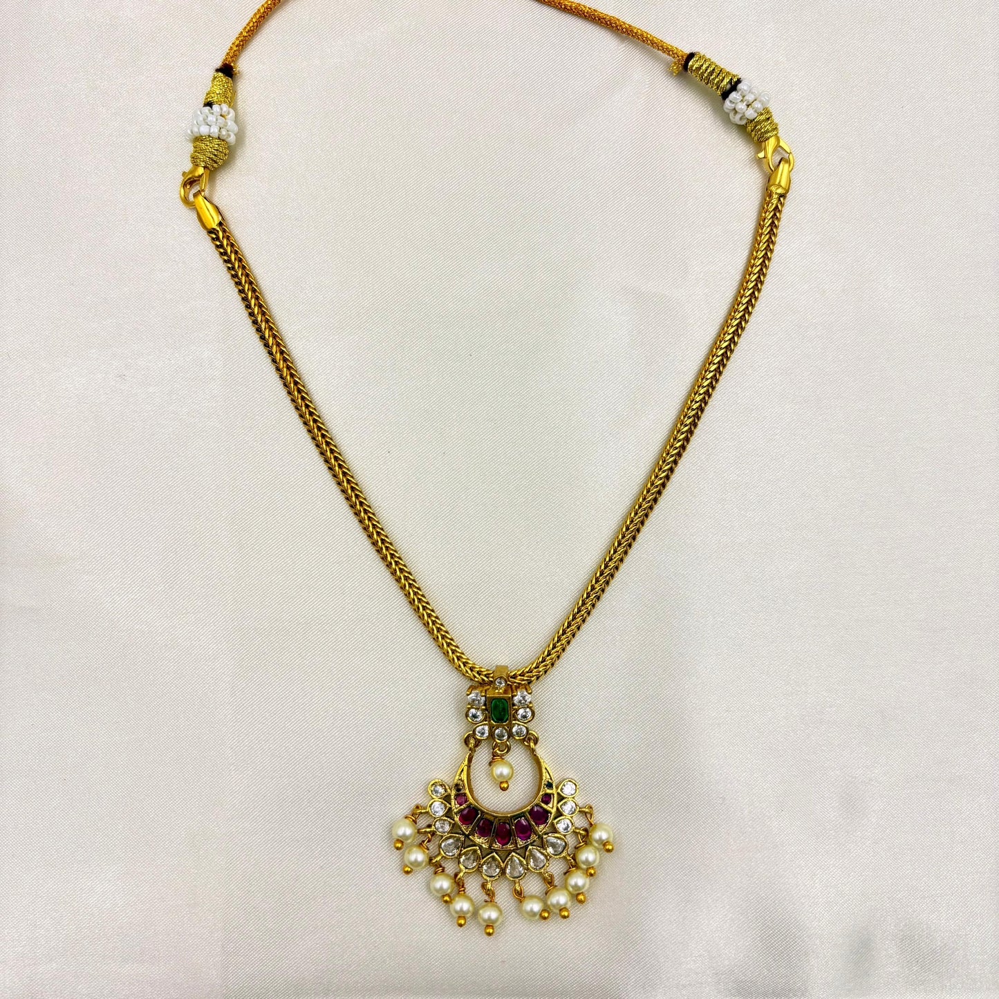 Antique Gold Finish Necklace Set with Green & Pink Stones and Pearl Drops
