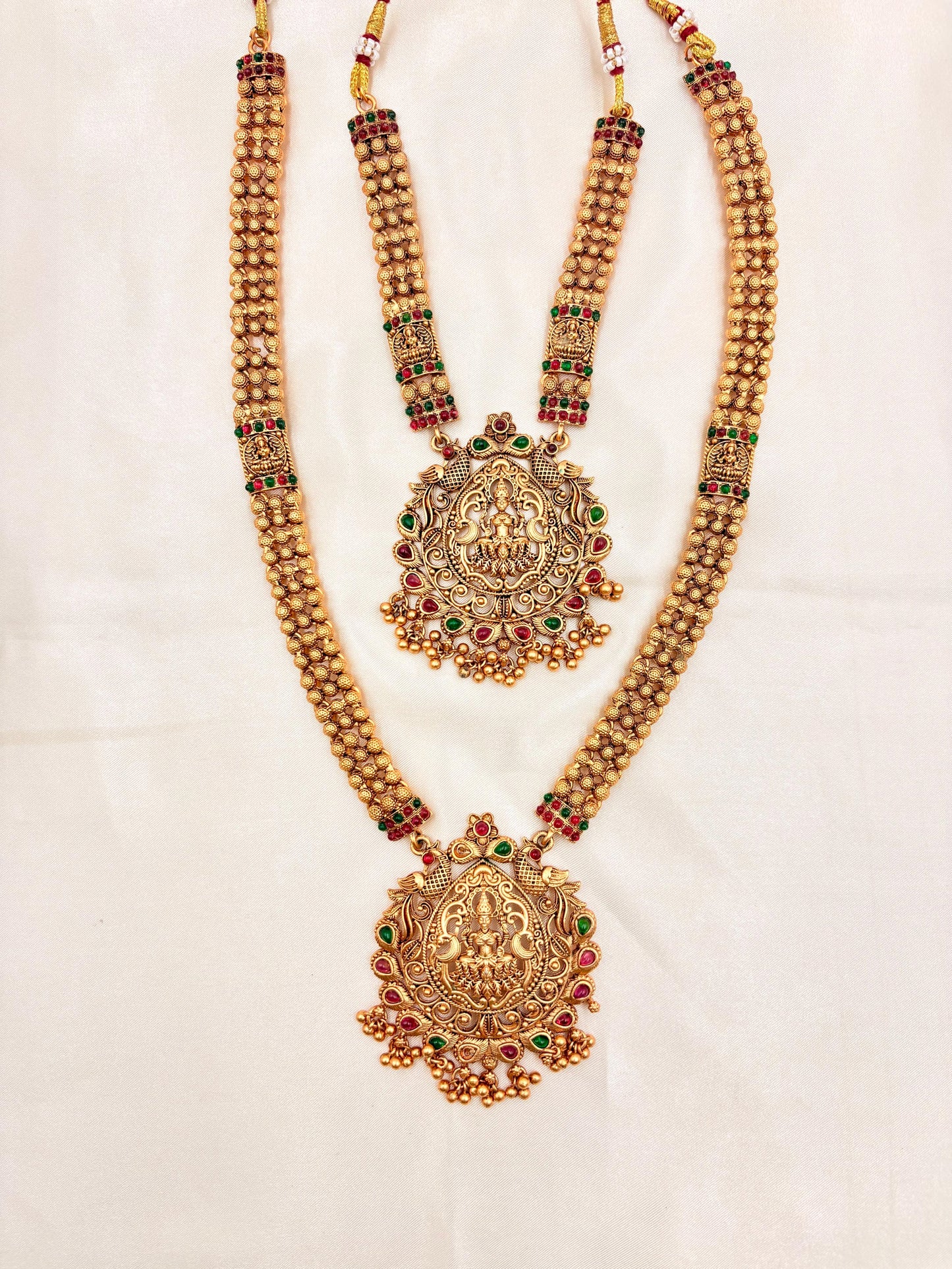 Grand Double Layer Antique Gold Temple Haram with Lakshmi Pendants & Jhumka Earrings