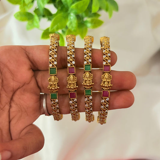Gold-Plated Lakshmi Temple Bangles with Green & Ruby Stones – Bridal South Indian Design
