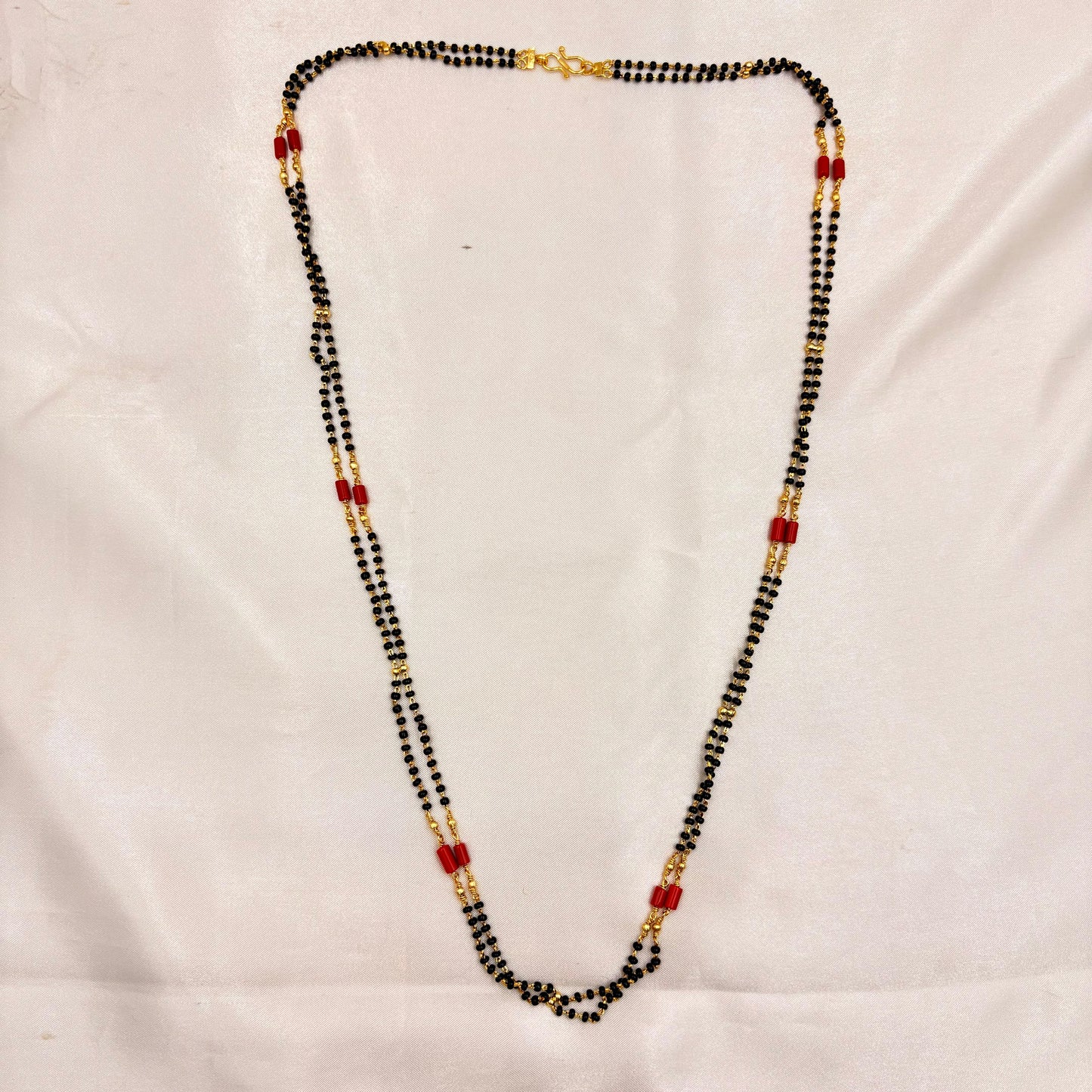 Classic Long Black Beads Mangalsutra with Red Accents – Gold Finish