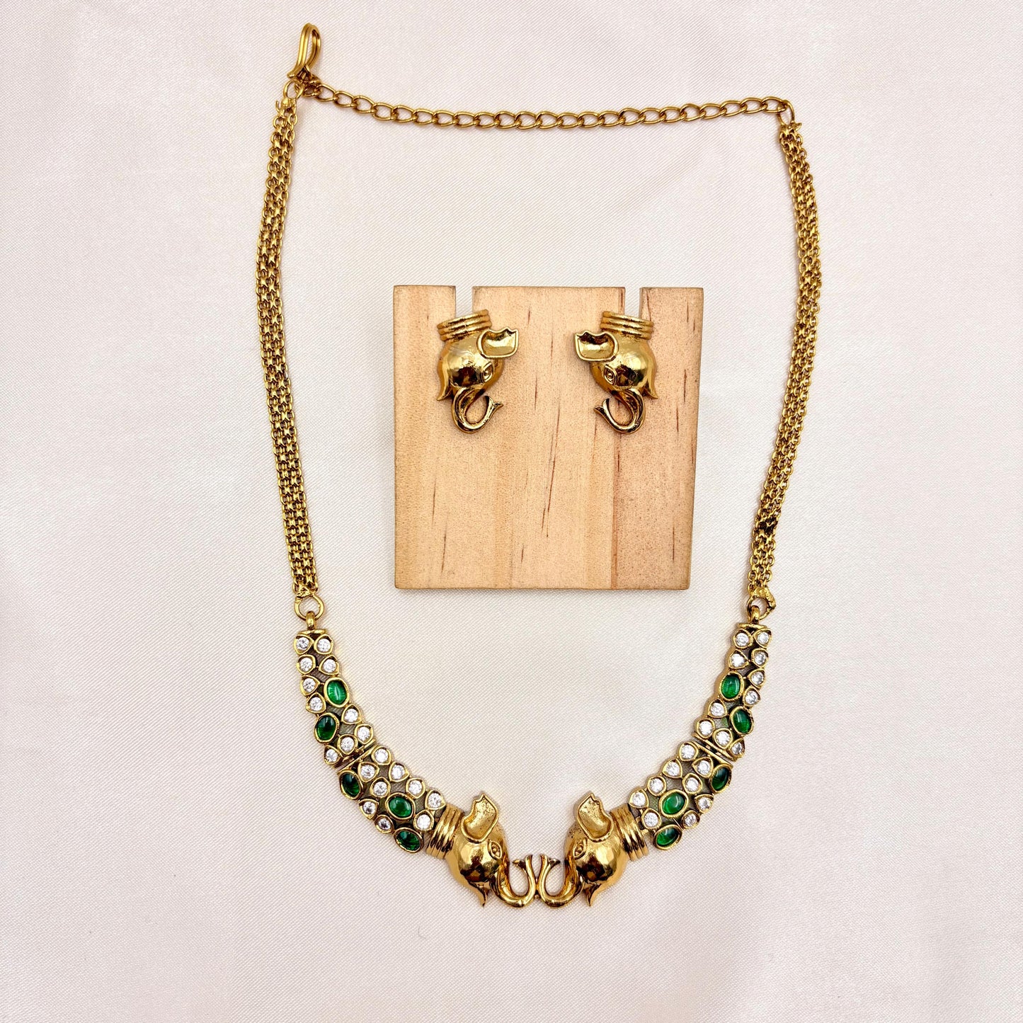 Elephant Motif Necklace Set with Green Stones – Gold Finish