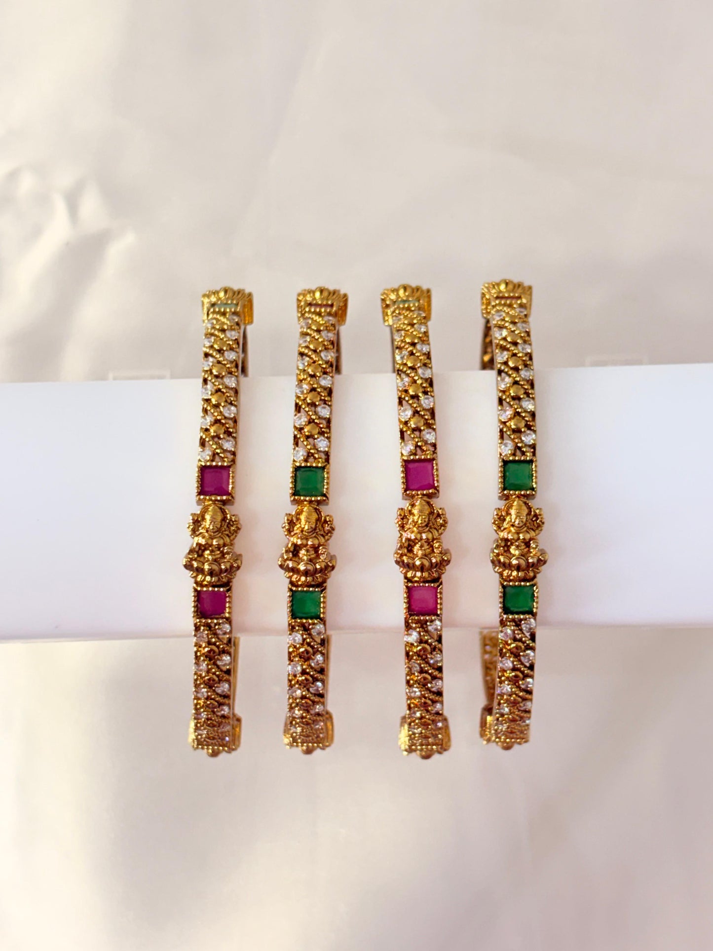 Gold-Plated Lakshmi Temple Bangles with Green & Ruby Stones – Bridal South Indian Design