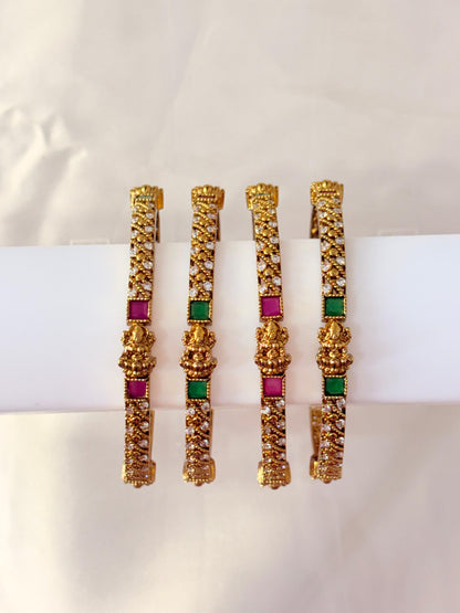 Gold-Plated Lakshmi Temple Bangles with Green & Ruby Stones – Bridal South Indian Design