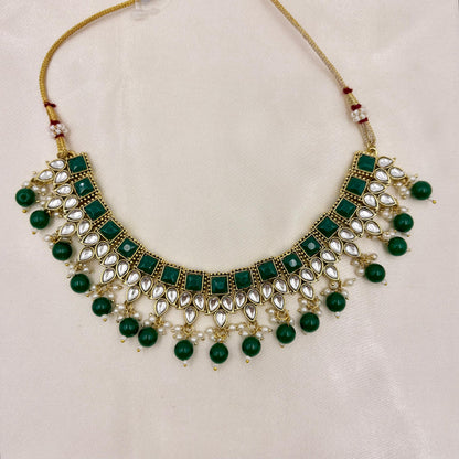 Gold Finish Green Kundan Necklace Set with Pearl Drops & Maang Tikka