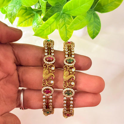 Gold-Plated Peacock Design Bangles with Ruby & Green Stones – Traditional Bridal Bangles